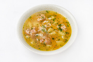 soup with meatballs on the white