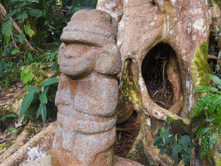 Phallic stone sculpture in the jungle of San Agustín Park, Colombia
