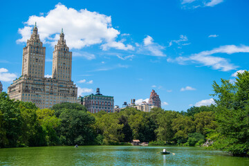nyc and manhattan. central park of new york. Beautiful view of the Jacqueline Kennedy Onassis Reservoir in urban park. city landscape of manhattan ny from central park. Serene escape amid the city