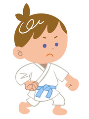空手をする少年
