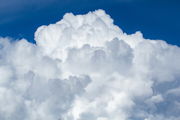 Naklejka na ściany i meble Blue sky with puffy fluffy clouds, horizontal natural background