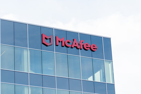 McAfee sign on the building in Santa Clara, California, USA - June 10, 2023. McAfee Corp. is an American global computer security software company.