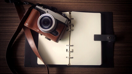 Retro Camera on Blank Book, Camera With Empty Space For Text...,