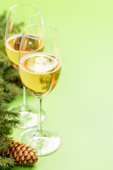 Xmas fir tree branch, champagne and space