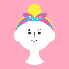 ヘアバンドを付けたお団子頭の女性