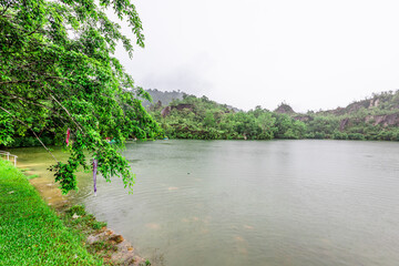 The natural background of the beautiful twilight sky, the surrounding atmosphere (trees, rivers, mountains) is a beautiful view of the journey, the view point.