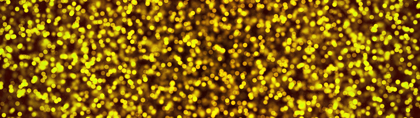 Fototapeta na wymiar Beautiful golden bokeh particles abstract light on black background