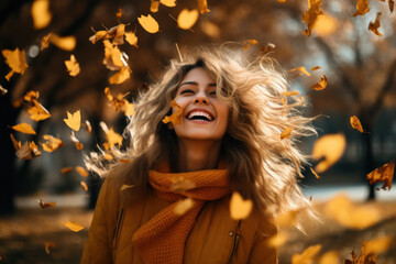 Radiant young woman embracing autumn's spirit in a park, her outfit echoing fall colors, beaming with joy