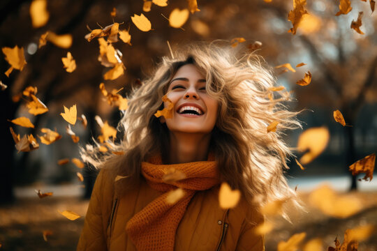 Radiant young woman embracing autumn's spirit in a park, her outfit echoing fall colors, beaming with joy