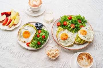 Fototapeta na wymiar healthy breakfast bread Avocado Fried Egg and Salad