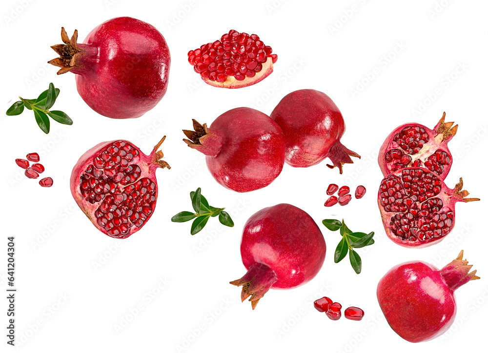 Wall mural flying pomegranate with seeds and green leaves isolated on a white background. clipping path