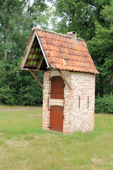 Fototapeta na wymiar small ancient brick pigeon house, Bokrijk, Genk, Belgium