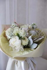 a beautiful bouquet in beige tones.Mother's Day. a bouquet in white delicate flowers