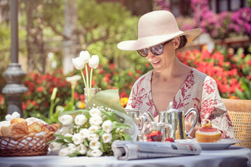 Woman Relaxing and Having Brunch