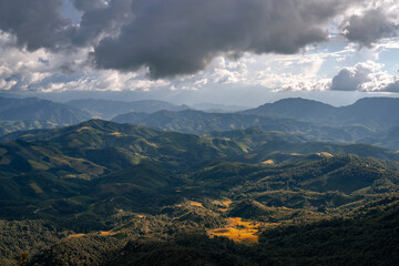 Beautiful mountain range view point with cumulonimbus cloud and storm in northern of Thailand (Tak province, Thailand)