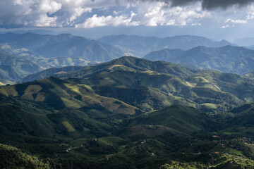 Beautiful mountain range view point with cumulonimbus cloud and storm in northern of Thailand (Tak province, Thailand)