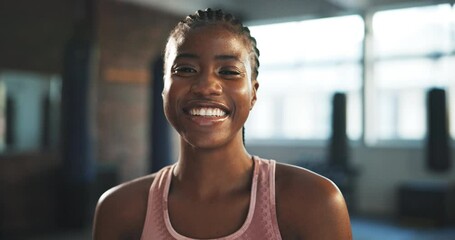 Gym face, black woman and happy for exercise, training and female bodybuilder workout, challenge or boxing studio pride. Sports personal trainer, coach portrait and smile for active fitness club