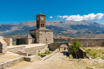 Fototapeta na wymiar Clock tower in the Ottoman Castle Fortress of Gjirokaster or Gjirokastra. Albanian