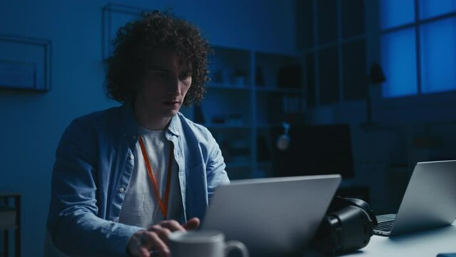 Male IT engineer having problems with computer, system error, getting hacked