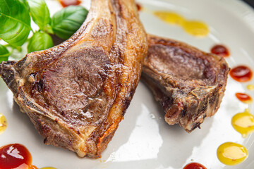 lamb cutlet on the bone fresh meat portion food ready to eat healthy appetizer meal food snack on the table
