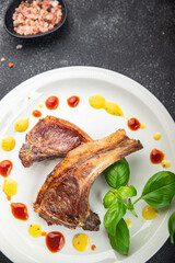 lamb cutlet on the bone fresh meat portion food ready to eat healthy appetizer meal food snack on the table