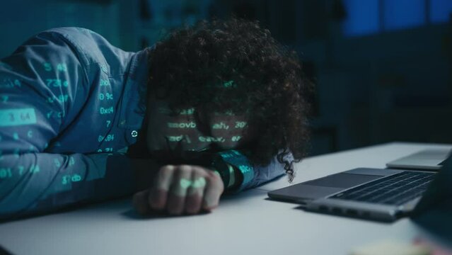 Young male hacker sleeping at his desk, underground life, cinematic look, future
