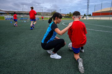 Youth soccer coach, directs daily training.