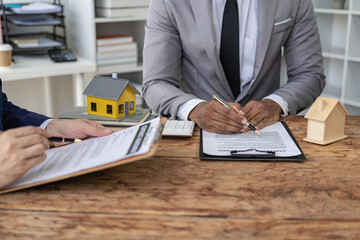 Real estate agents auction houses on projects to explain in detail to clients. Describe and present...