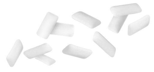 Many chewing gum pads falling on white background