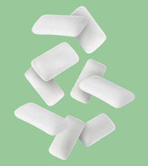 Many chewing gum pads falling on aquamarine color background