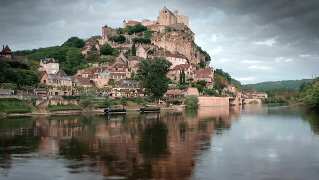 Beynac Castel, Dordogne - France. Cinematic View Above The River. Beynac-et-Cazenac village
