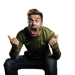 Young man watching a football match in front of a couch and shouting alone on a transparent background