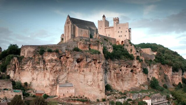 Castle On A Huge Rock Massif. View Of Beynac In Perigord above the River Dordogne