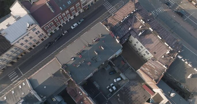 Aerial Drone Shot of Podgorze historical Jewish Ghetto neighborhood of Krakow Poland with the river Vistula at Sunrise