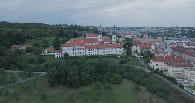 Aerial Drone Shot Prague Czech Republic Strahovsky Klaster Mala Strana Cloudy at Sunset