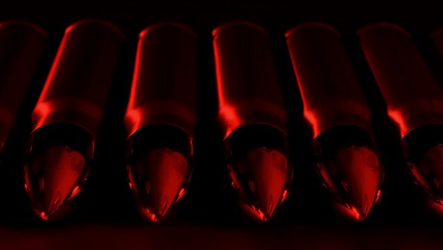 Row Of Bullets In Red Lethal Arms Concept