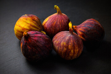 figs on a stone plate isolated.