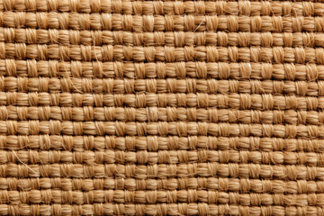 Intricate Patterns and Earthy Tones: A Close-Up Texture of a Sisal Woven Mat