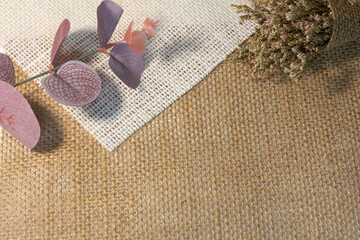 dried flowers, texture a burlap background 