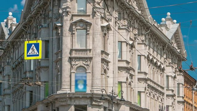 Symbolic Crossroads: Five Corners Timelapse in St. Petersburg, Russia. Highlighting a Tenement House with a Distinctive Turret, Set amidst Urban Traffic