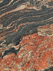 Marble texture background grain textured surface black and red orange color. Vintage style stone plate marbling wallpaper. Elegant royal design for print projects