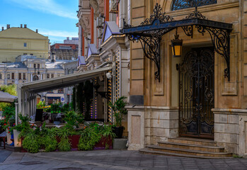 Fototapeta premium Street in center of Moscow in Russia. Cozy cityscape in Moscow. Architecture and landmarks of Moscow.