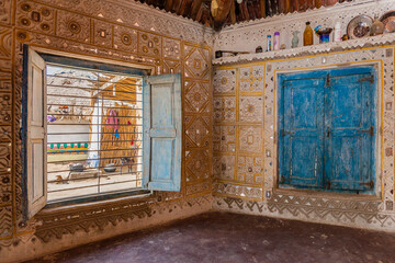 BHERANDIALA VILLAGE, KUTCH, GUJARAT, INDIA: interior of a decorated Meghwal house