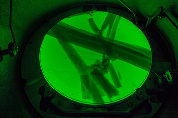 Actinolite fibers (asbestos variety) seen on the fluorescent screen of a transmission electron microscope (TEM), x50 000 magnification. Environmental laboratory specialised in asbestos