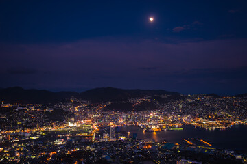 Fototapeta premium Spectacular elevated night view of Nagasaki, called 10 Million Dollar Night View, from Mount Inasa observatory, Japan