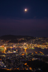 Spectacular elevated night view of Nagasaki, called 10 Million Dollar Night View, from Mount Inasa observatory, Japan