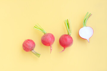 Fresh radish and sliced on yellow background, Organic vegetable