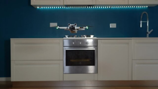 Real estate home shooting with drone - professional photographer use drone to take photos and video of the house to sell - real estate agency takes over the interior of the house 