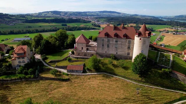 Switzerland travel and landmarks. scenic medieval village and castle Gruyere. canton Fribourg. Aerial drone video
