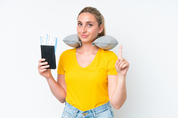Woman with Inflatable Travel Pillow showing and lifting a finger